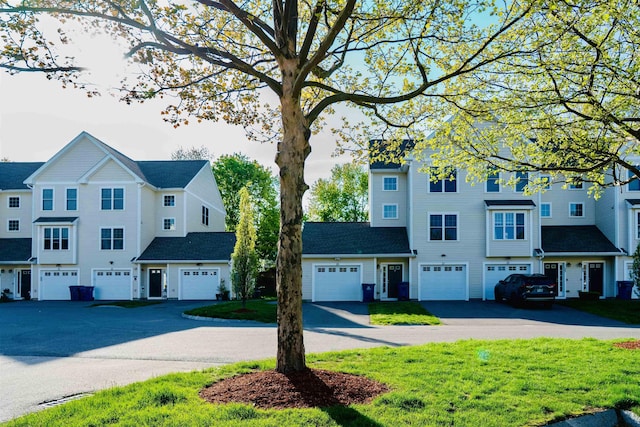29 Bennett St, Nashua, NH 03064 - view of front of property featuring driveway and a garage