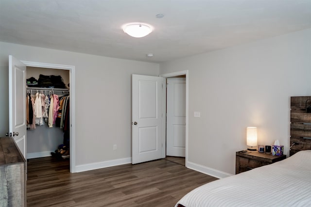 29 Bennett St, Nashua, NH 03064 - bedroom with wood finished floors, baseboards, and a closet