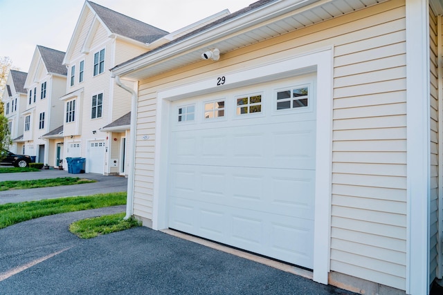 29 Bennett St, Nashua, NH 03064 - garage with a residential view and driveway