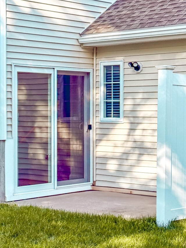 29 Bennett St, Nashua, NH 03064 - property entrance with a shingled roof