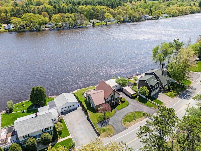 1385 Front St, Manchester, NH 03102 - aerial view of residential area with a nearby body of water and a heavily wooded area