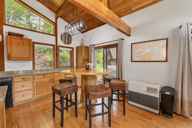 kitchen with black dishwasher, beamed ceiling, wooden ceiling, light wood-type flooring, and heating unit