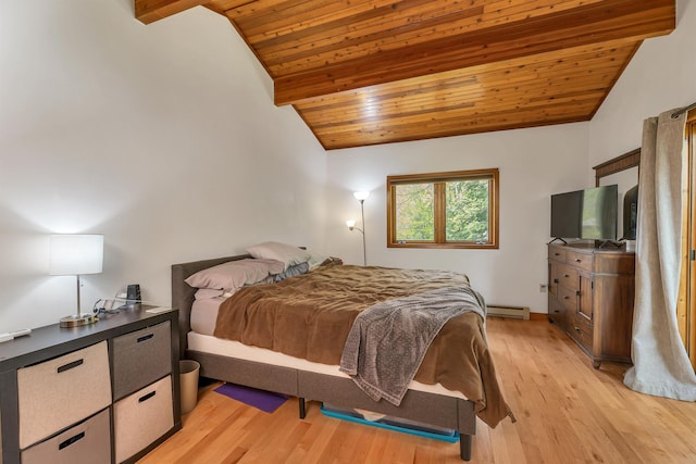 bedroom featuring vaulted ceiling, wooden ceiling, baseboard heating, and light wood finished floors