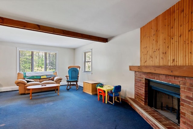 carpeted living room with a brick fireplace, baseboards, beamed ceiling, and wooden walls