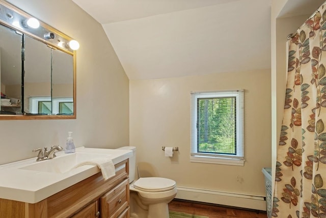full bathroom featuring a baseboard radiator, vaulted ceiling, toilet, vanity, and wood finished floors