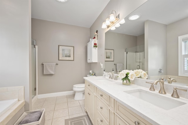 full bath with a stall shower, tile patterned floors, a garden tub, double vanity, and toilet