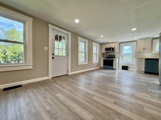 516 Hall St, Bow, NH 03304 - unfurnished living room with light wood-style flooring, baseboards, and recessed lighting