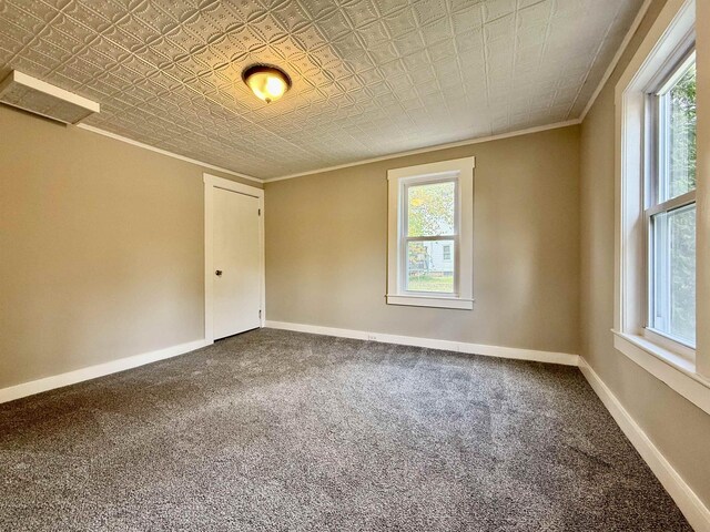 516 Hall St, Bow, NH 03304 - carpeted spare room featuring crown molding, an ornate ceiling, and baseboards