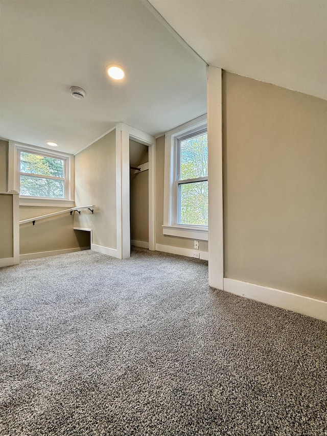 516 Hall St, Bow, NH 03304 - unfurnished bedroom featuring multiple windows, carpet flooring, baseboards, and recessed lighting