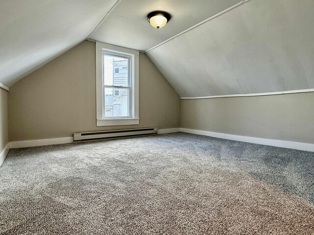 516 Hall St, Bow, NH 03304 - bonus room featuring baseboard heating, carpet, vaulted ceiling, and baseboards