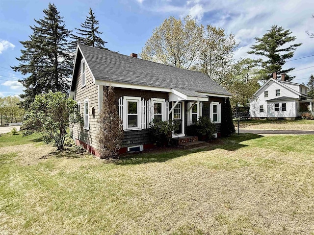 516 Hall St, Bow, NH 03304 - bungalow-style house featuring a front yard, roof with shingles, and a chimney