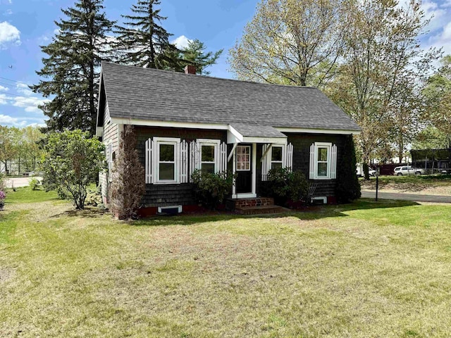 516 Hall St, Bow, NH 03304 - cape cod house with a front lawn, a shingled roof, and a chimney