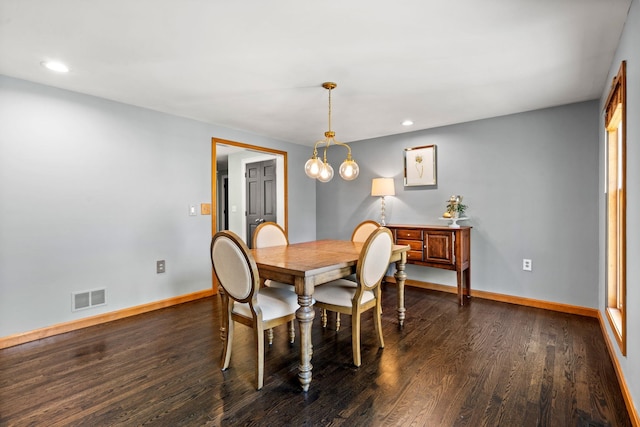 dining room featuring baseboards, dark wood-type flooring, and recessed lighting