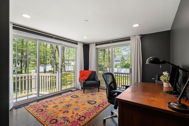 home office featuring wood finished floors and recessed lighting