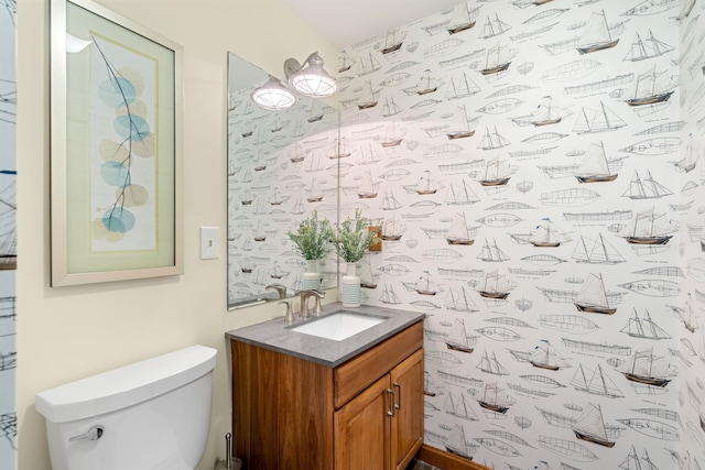 bathroom with vanity and toilet