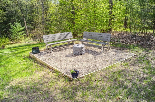 view of community with a yard