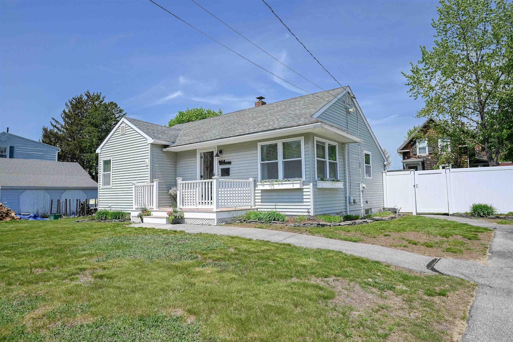 206 Villa St, Manchester, NH 03103 - bungalow featuring a chimney, a gate, and roof with shingles