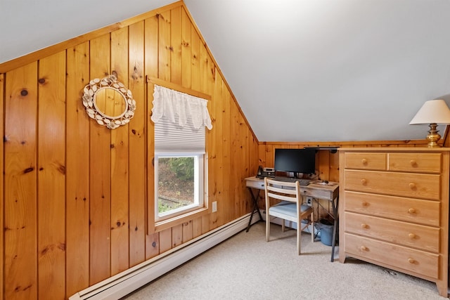 home office with baseboard heating, vaulted ceiling, light carpet, and wooden walls