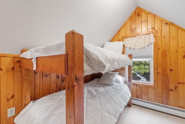 carpeted bedroom with a baseboard radiator, lofted ceiling, and wooden walls