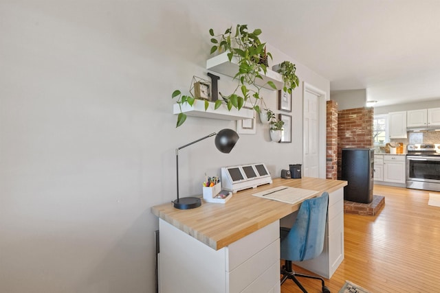 office space featuring light wood-style flooring