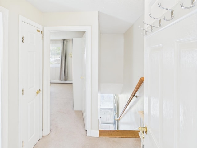 8 Lincoln Dr Unit B, Hooksett, NH 03106 - hall featuring carpet, an upstairs landing, baseboard heating, and baseboards