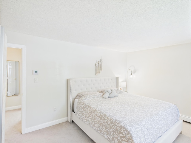 8 Lincoln Dr Unit B, Hooksett, NH 03106 - bedroom featuring carpet flooring, a textured ceiling, and baseboards