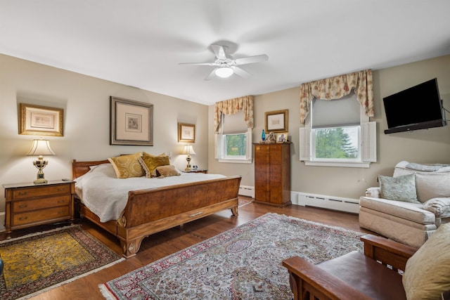 5893 Stage Rd, Barnard, VT 05031 - bedroom featuring baseboard heating, wood finished floors, and ceiling fan