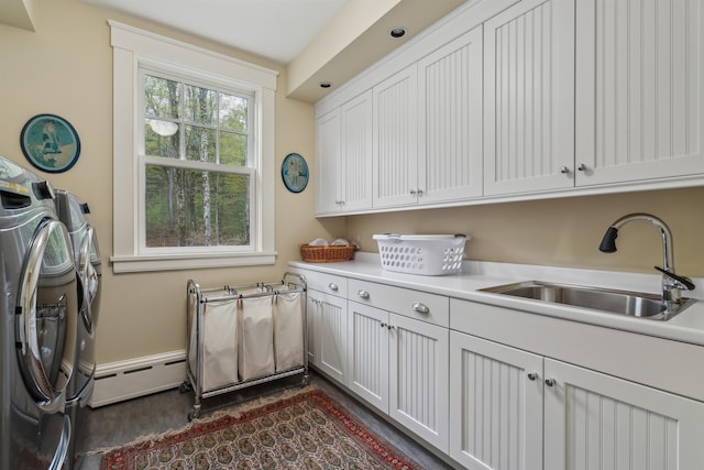 5893 Stage Rd, Barnard, VT 05031 - laundry room featuring cabinet space, a baseboard radiator, washer and clothes dryer, and dark wood-style flooring
