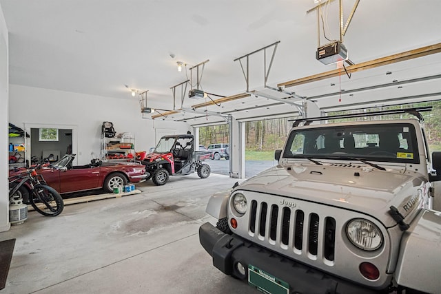 5893 Stage Rd, Barnard, VT 05031 - garage featuring a garage door opener
