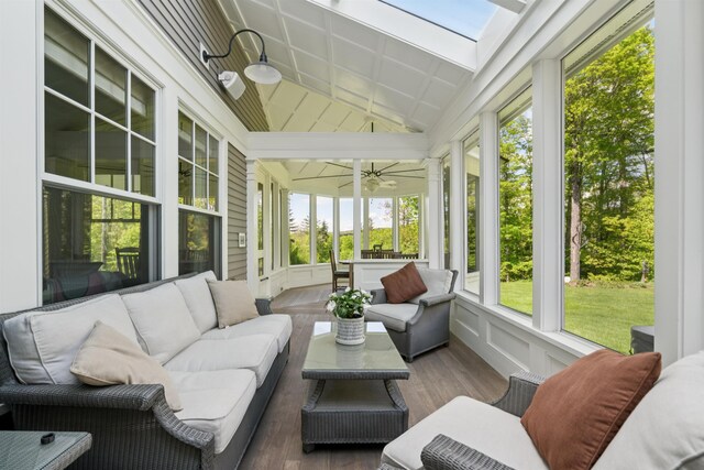 5893 Stage Rd, Barnard, VT 05031 - sunroom / solarium with outdoor lounge area, a ceiling fan, a skylight, and vaulted ceiling