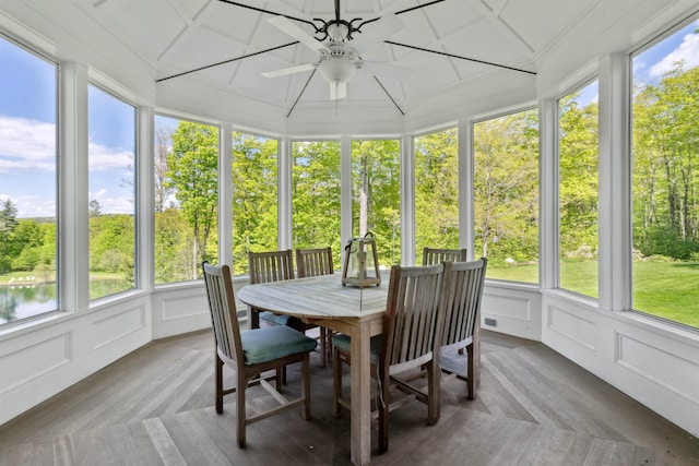 5893 Stage Rd, Barnard, VT 05031 - sunroom / solarium featuring a ceiling fan, a decorative wall, and outdoor dining area