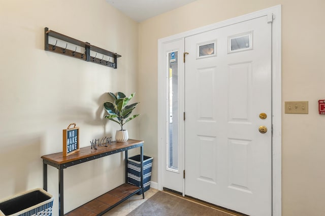 entrance foyer featuring baseboards
