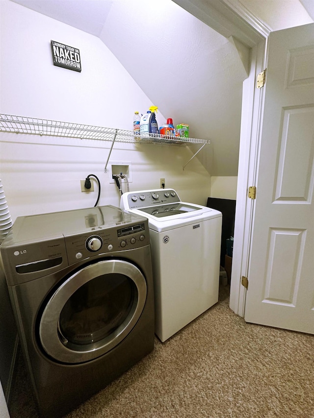 laundry room with washer and dryer and carpet floors