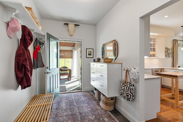 mudroom featuring baseboards