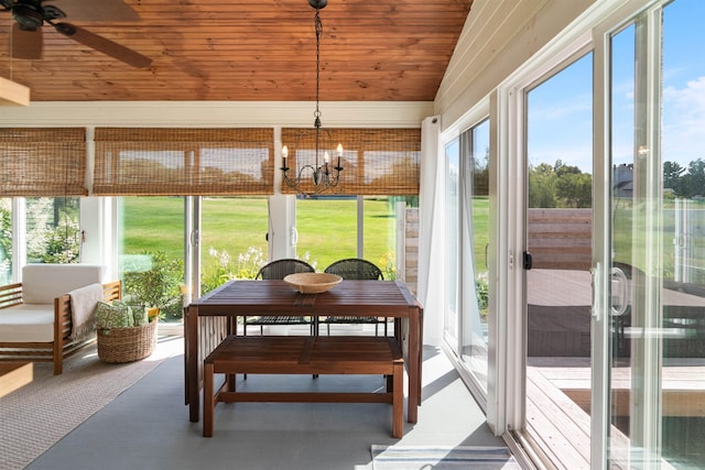sunroom featuring wood ceiling, a ceiling fan, and a chandelier