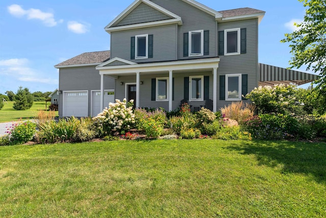 traditional-style home with an attached garage, a front lawn, covered porch, and a shingled roof
