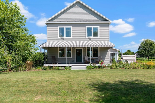 view of front of property featuring a porch and a front lawn