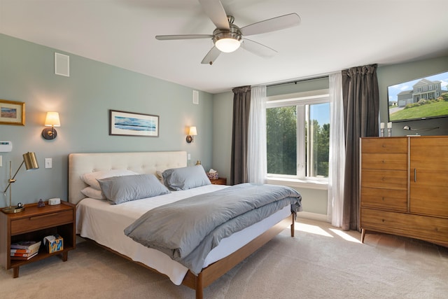 bedroom featuring carpet flooring and a ceiling fan