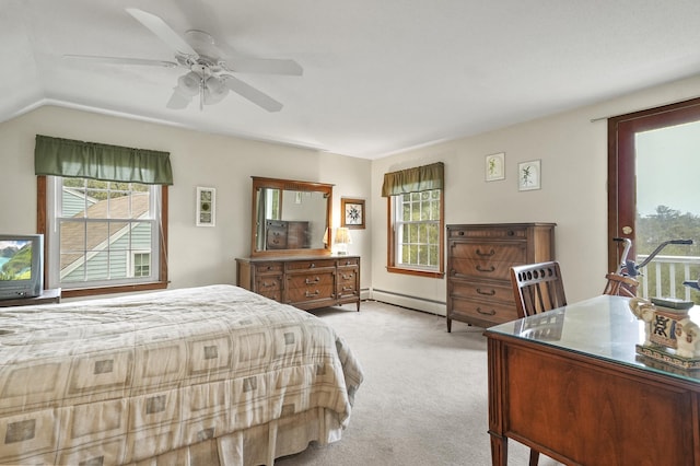 bedroom featuring light carpet, a baseboard radiator, lofted ceiling, and a ceiling fan