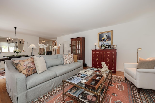203 Straw Hill Rd, Manchester, NH 03104 - living room with a chandelier and wood finished floors