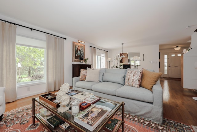 203 Straw Hill Rd, Manchester, NH 03104 - living area featuring wood finished floors and baseboards
