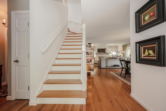 203 Straw Hill Rd, Manchester, NH 03104 - stairway featuring wood finished floors