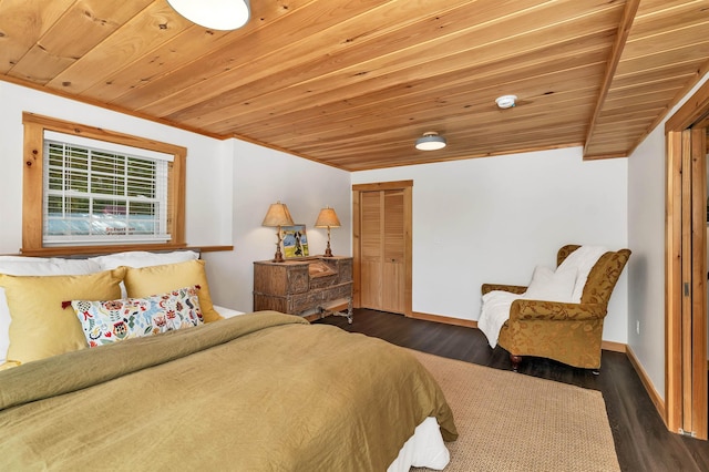 bedroom featuring wooden ceiling, dark wood-style floors, and baseboards