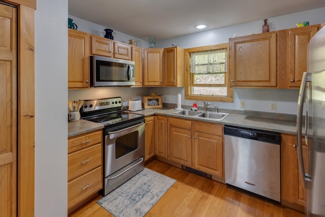 273 Berkshire Rd, Lisbon, NH 03585 - kitchen featuring stainless steel appliances, a sink, light wood finished floors, and recessed lighting