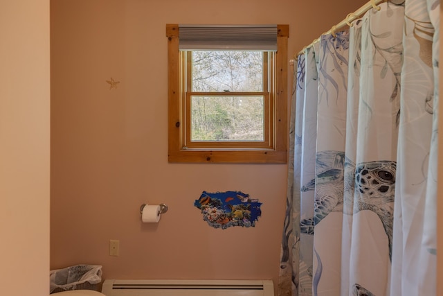 273 Berkshire Rd, Lisbon, NH 03585 - bathroom featuring a baseboard radiator, toilet, and a shower with curtain
