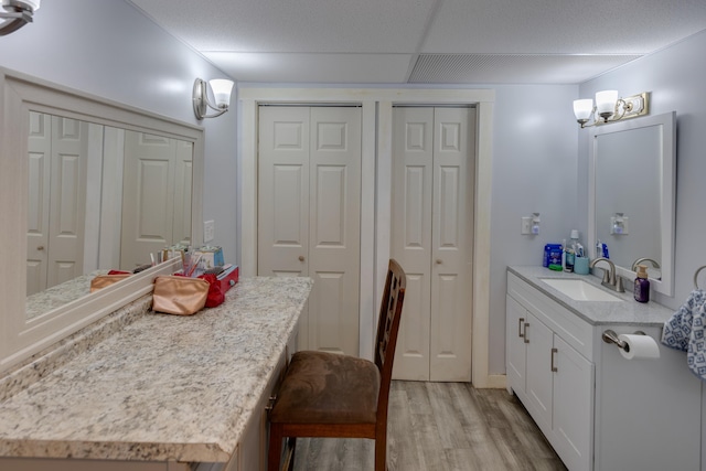 273 Berkshire Rd, Lisbon, NH 03585 - bathroom with a closet, wood finished floors, and vanity