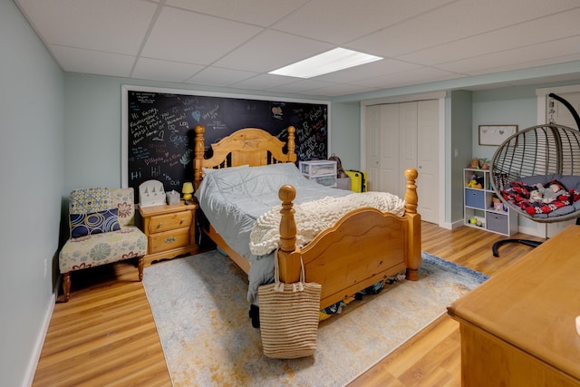 273 Berkshire Rd, Lisbon, NH 03585 - bedroom with wood finished floors, a paneled ceiling, baseboards, and a closet