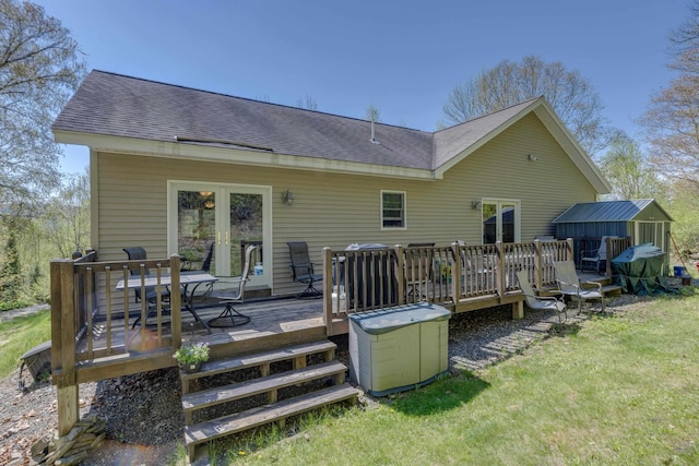 273 Berkshire Rd, Lisbon, NH 03585 - rear view of house featuring a wooden deck, a shingled roof, and a lawn