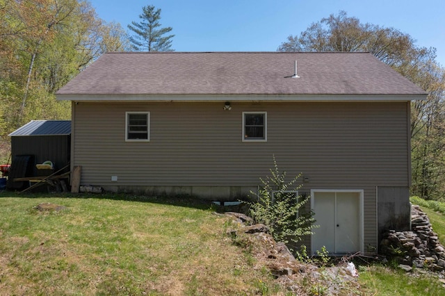 273 Berkshire Rd, Lisbon, NH 03585 - rear view of property featuring a lawn and roof with shingles