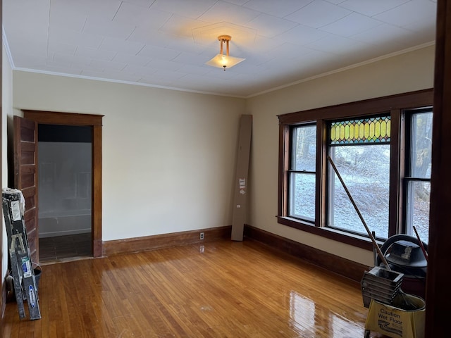 76 Center St, Richford, VT 05476 - empty room featuring wood finished floors and ornamental molding
